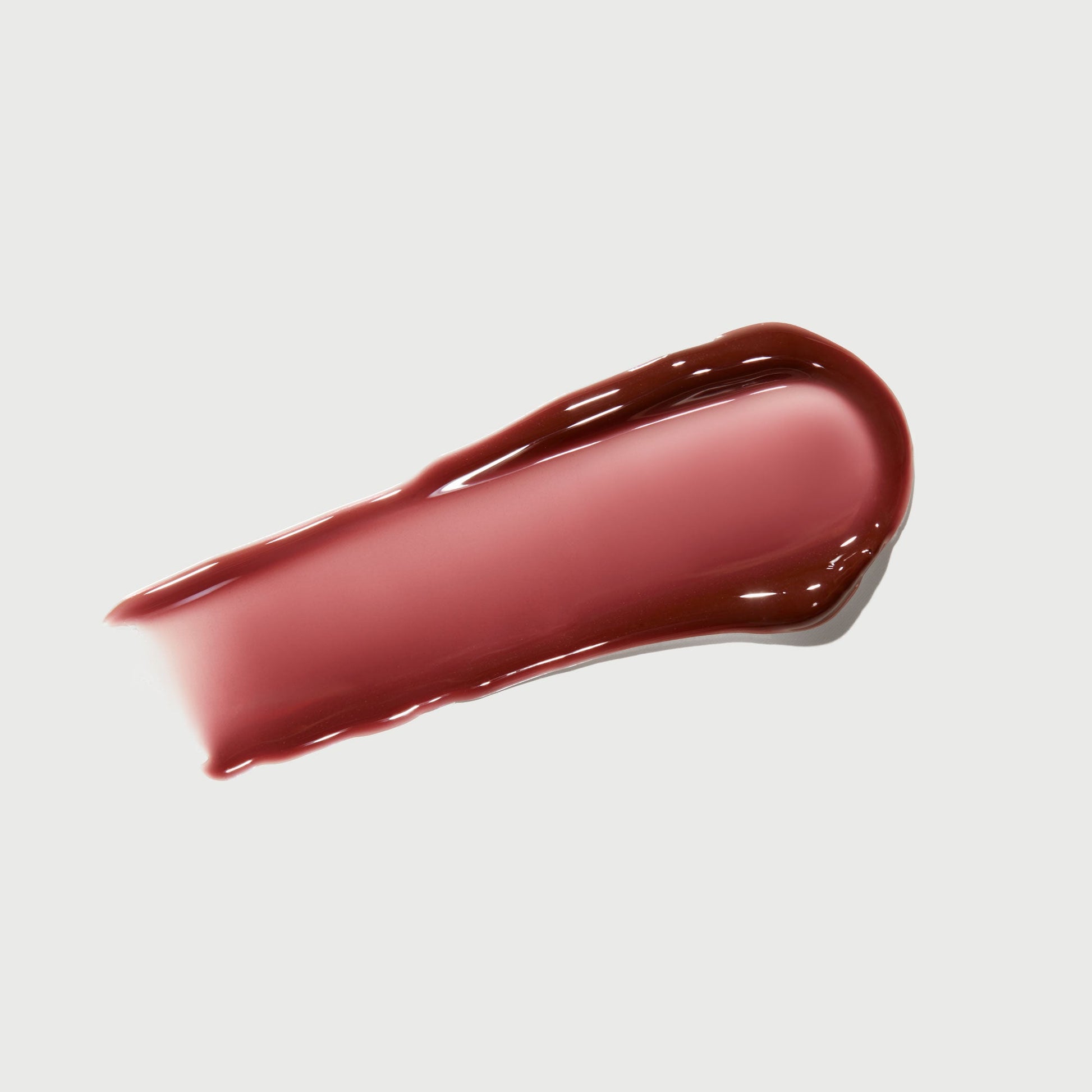 phyto-glow-lip-balm-crimson-d0 NATR-10122-Swatch-Phyto-Glow-Crimson-bonebkgd.jpg