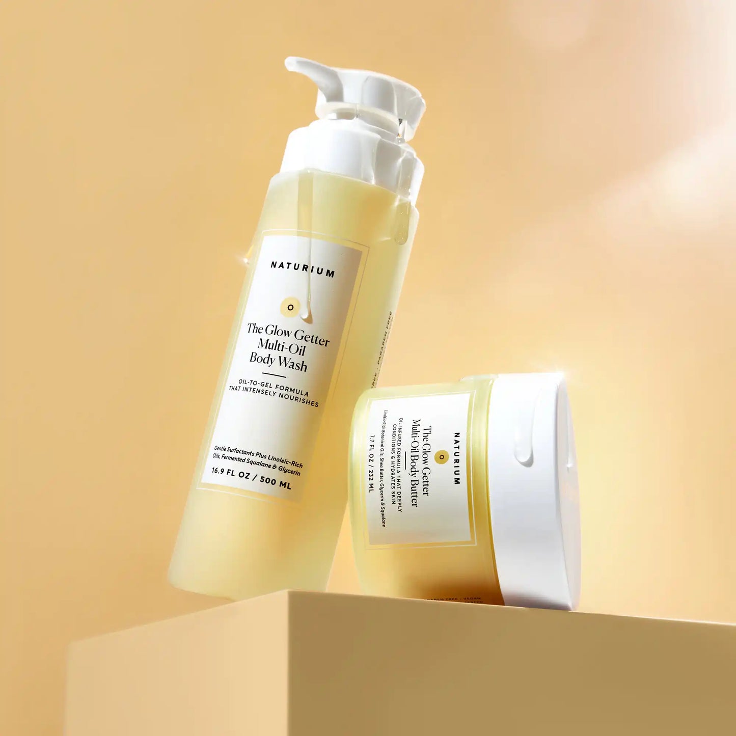 the-glow-all-out-body-bundle-m1 gg-bodybutter_1464-crop_revcolor_FL.webp